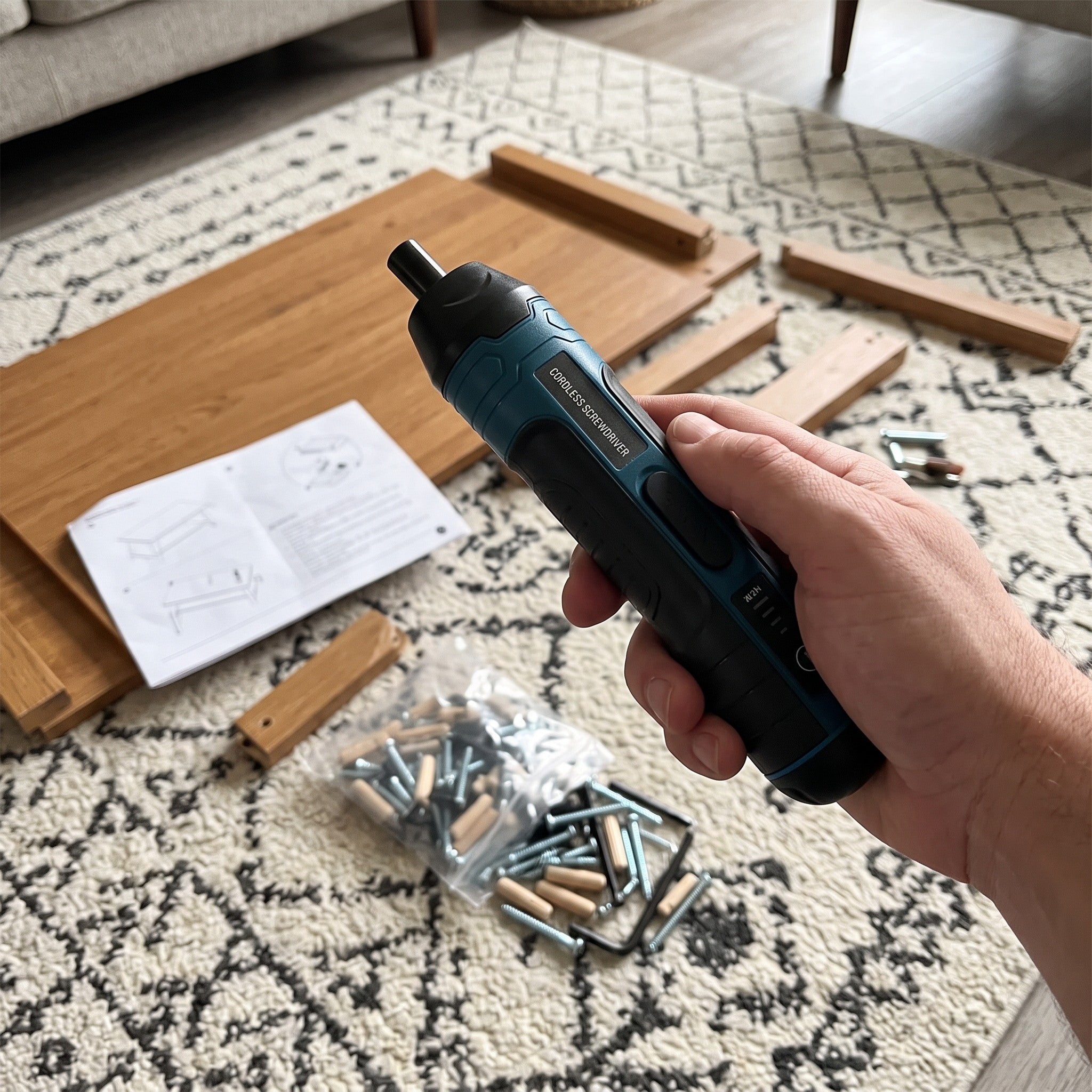 Hand carrying Turnwell towards a furniture assembly